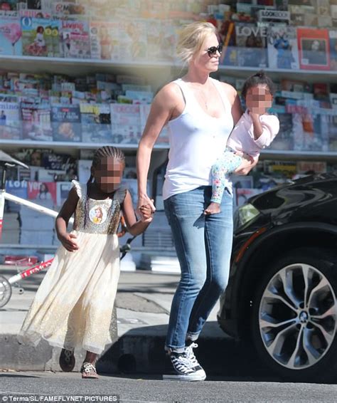 Charlize Theron natural beauty children for icecream treat ...