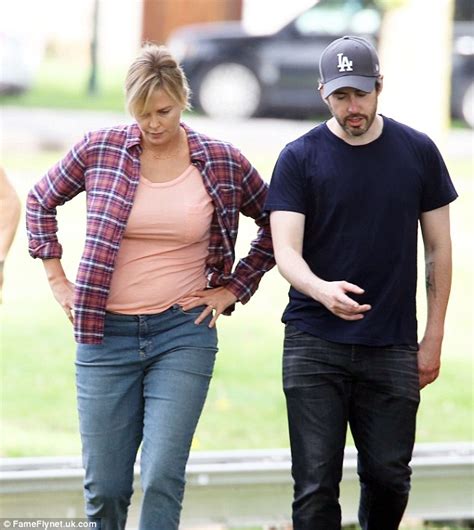 Charlize Theron shows fuller figure on set of Tully amid ...