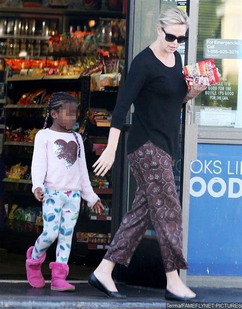Is Charlize Theron s Adopted Son Becoming a Girl? He Wears ...