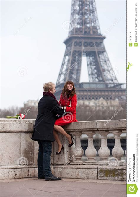 Romantic Couple In Paris, Near The Eiffel Tower Stock ...
